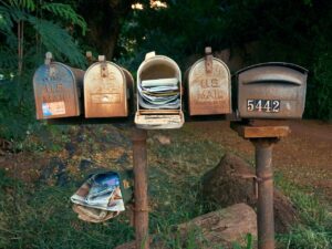 Image by Deborah Hudson from Pixabay - Overstuffed Mailboxes