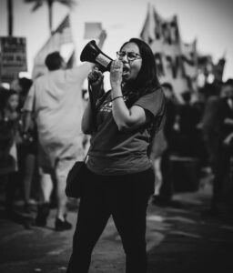 woman shouting on a megaphone